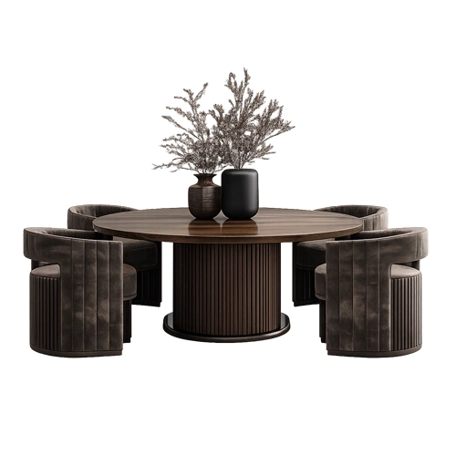A modern round coffee table with matching cushioned chairs, suitable for contemporary interiors in Qatar.