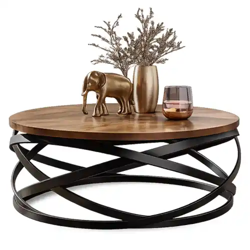 Round wooden coffee table with a decorative elephant figurine and vase, styled for modern interiors in Qatar.